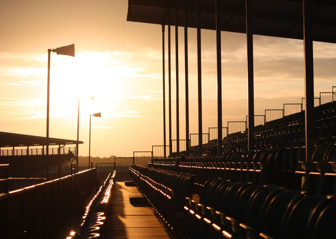 Silverstone grandstand in evening light.
