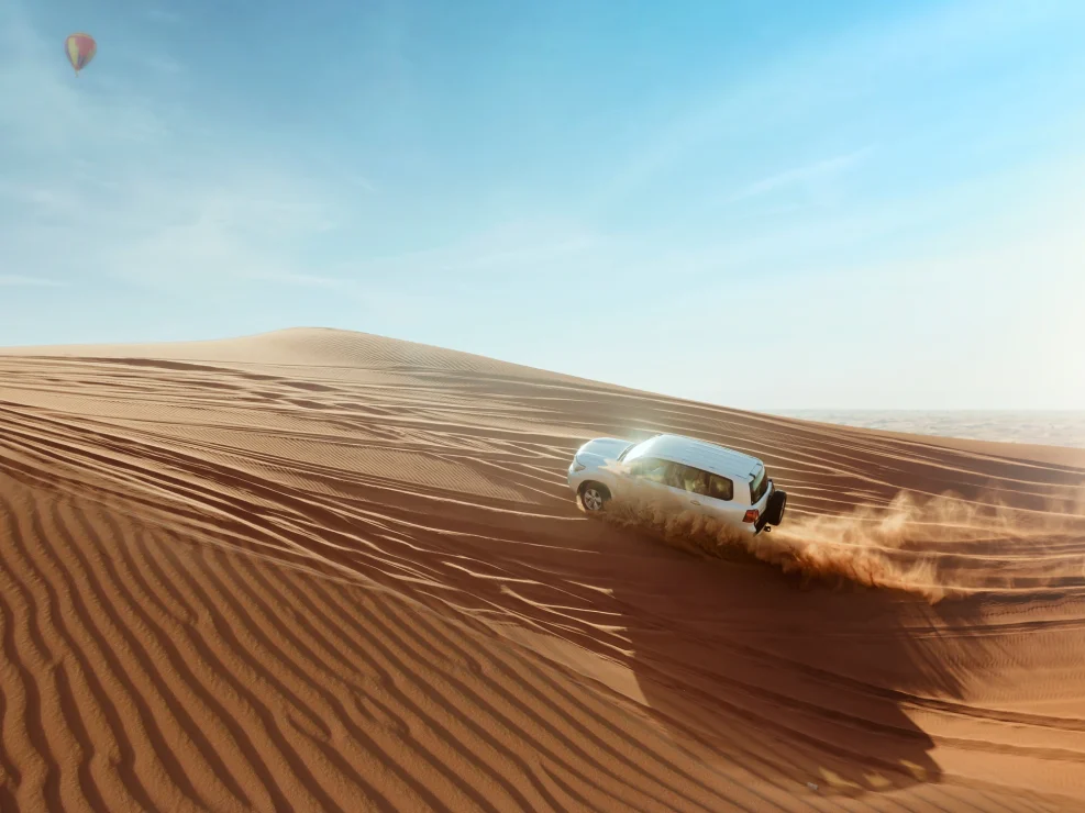 4x4 driving through the desert in Dubai.